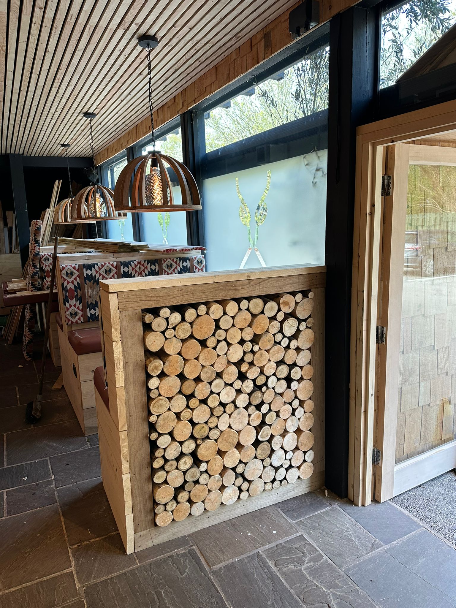 How Restaurants Use Decorative Logs to Create Atmosphere